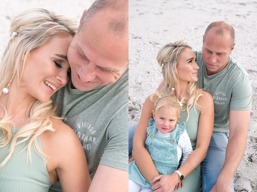 Family husband and wife with daughter beach